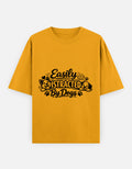 RAJIRU Easily Distracted by Dogs golden yellow oversized graphic T-shirt front view